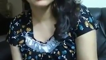 An Indian Aunt With Big Boobs And His Girlfriend Are Having Video Chat.