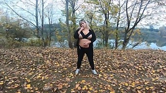 A Beautiful Fat Woman Plays With Her Boobs In A Public Park Near Lake
