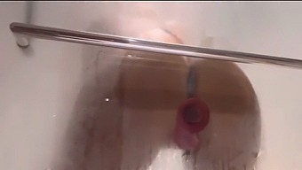 Get Ready To Get Wet And Wild With This Shower Dildo Fuck Video