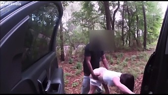 Young Sisters Receive A Rough Spanking From A Handsome Black Man In A Forest Setting