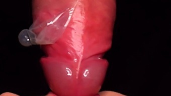 Intense Close-Up Of Condom Milking Handjob With Asmr Sucking